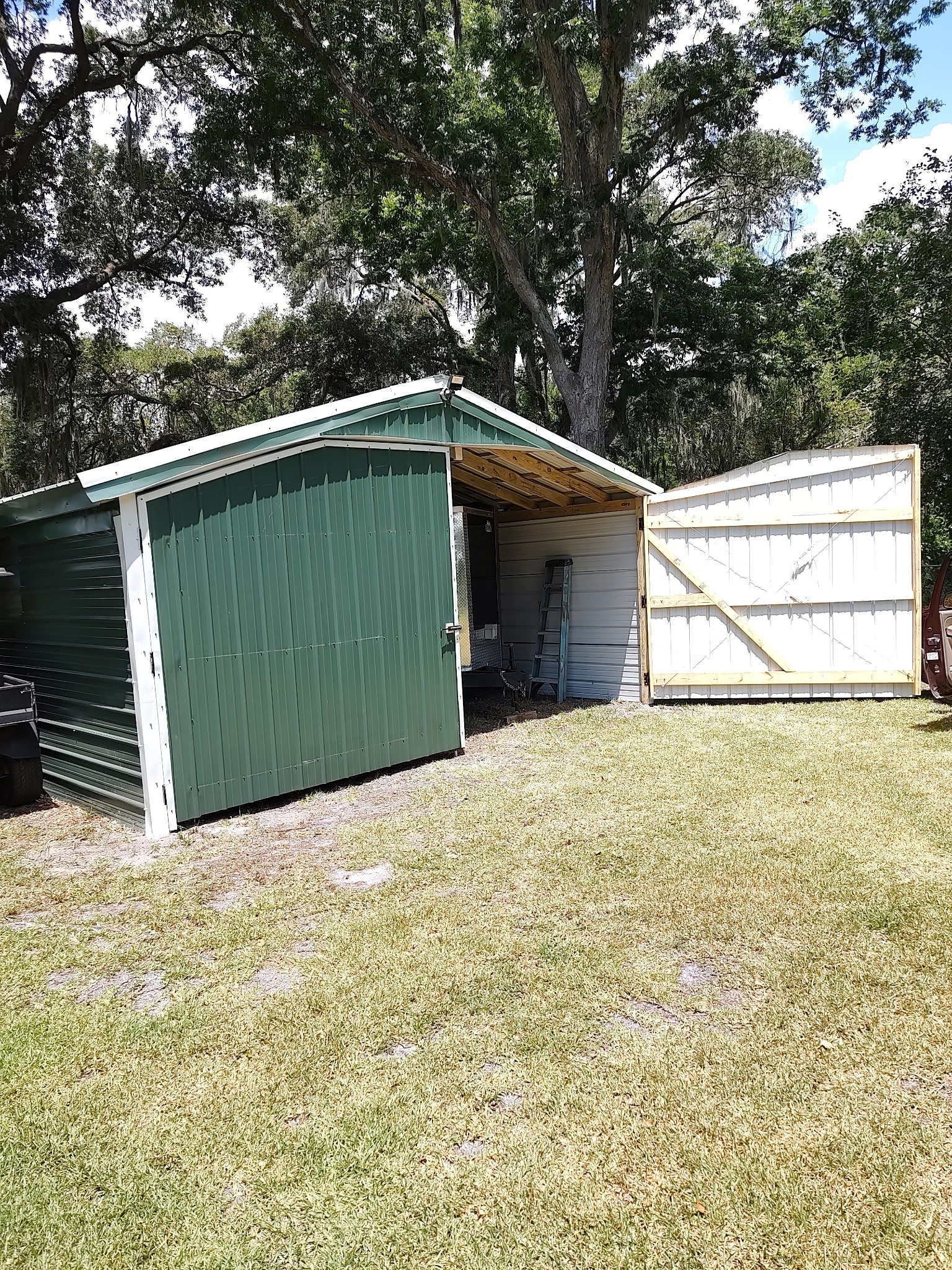 Custom shed build with attached carport